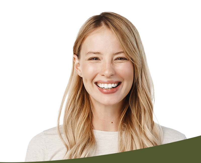 A smiling woman with blonde hair, wearing a white top, against a white background.